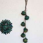 Suspension petites poteries en terre cuite
