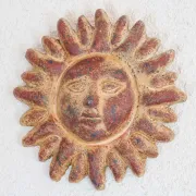 Soleil rouge terre cuite décoration murale