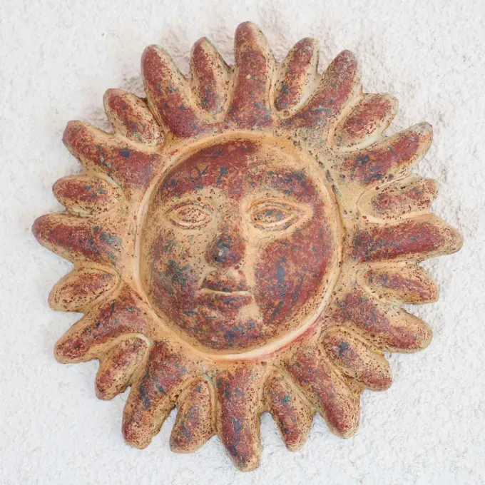 Soleil rouge terre cuite décoration murale