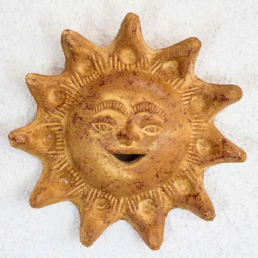 petit soleil en terre cuite décoration murale