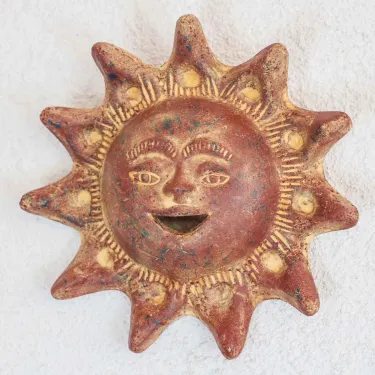 Petit soleil terre cuite déco murale