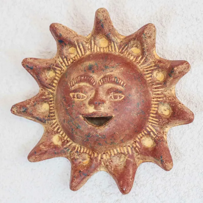 Petit soleil terre cuite déco murale