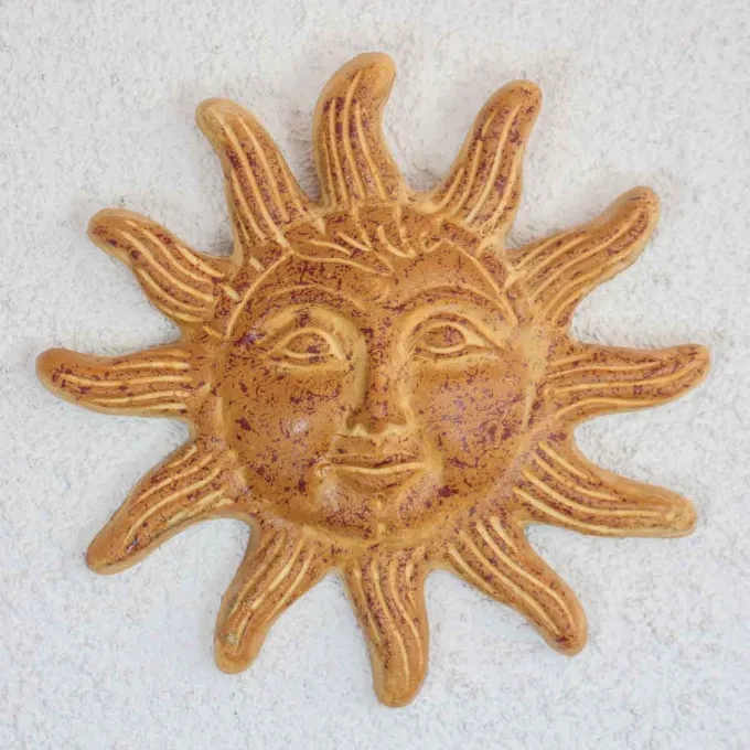 soleil en terre cuite à suspendre sur vos murs