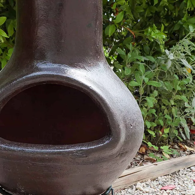 Petite cheminée de jardin en terre cuite chauffage convivial